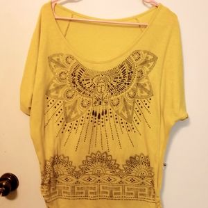 Ladies Short Sleeved Yellow Teashirt with a Black print with a Black beading